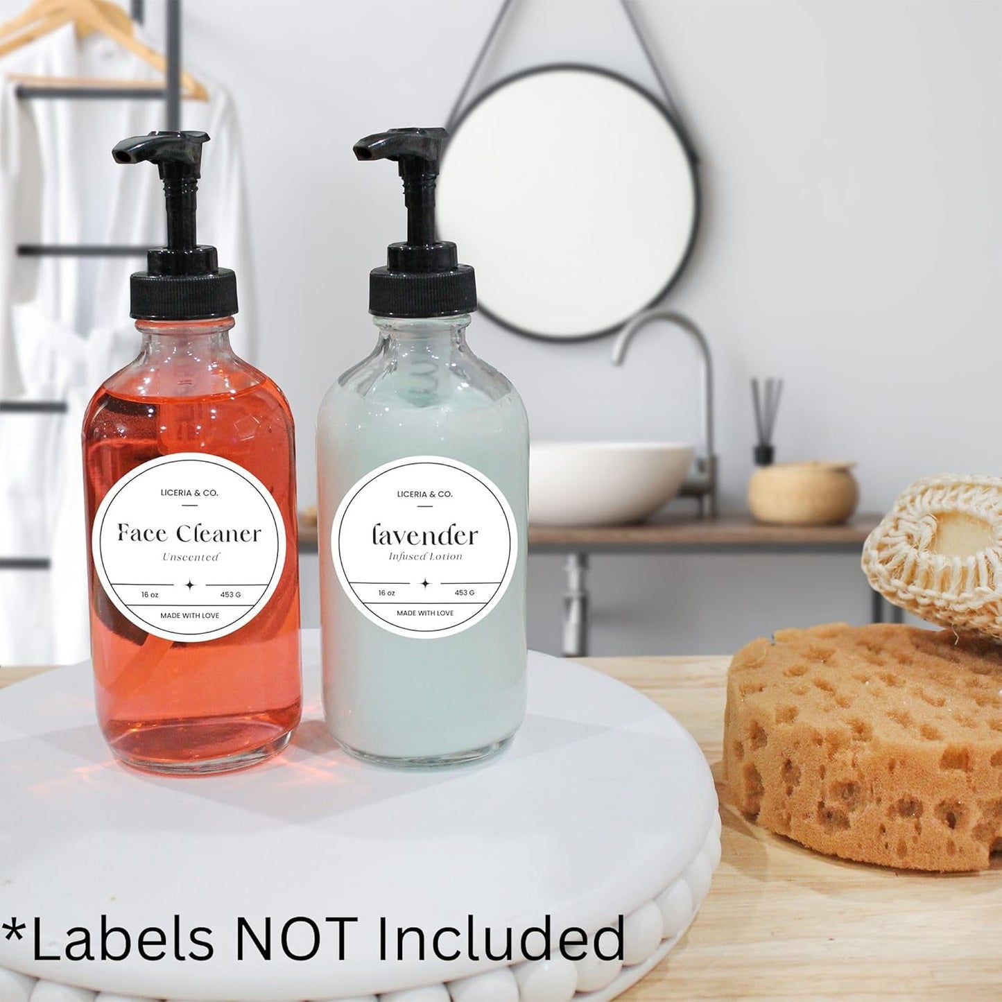 Cornucopia Brands 8oz Clear Glass Pump Bottles (4-Pack w/Black Plastic Pumps), Great as Essential Oil Bottles, Lotion Bottles, Soap Dispensers, and More